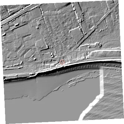 Shaded relief map of the ground around TR208JE, computed from Environment Agency LiDAR. The ground here sits at about 5 m above sea level and falls 13 m across the surrounding 800 m. Surface water reaching this point runs off ground lying to the north-north-west, 7.1 m higher.