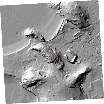 Shaded relief map of the ground around TR210JZ, computed from Environment Agency LiDAR. The ground here sits at about 16 m above sea level and falls 35 m across the surrounding 800 m. Surface water reaching this point runs off ground lying to the south-south-west, 19.4 m higher.