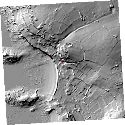 Shaded relief map of the ground around TR210NF, computed from Environment Agency LiDAR. The ground here sits at about 12 m above sea level and falls 49 m across the surrounding 800 m. Surface water reaching this point runs off ground lying to the east-north-east, 31.6 m higher.