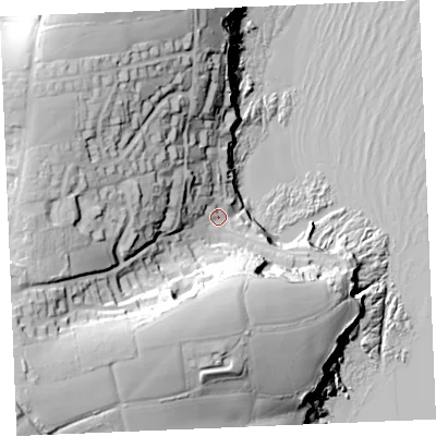 Shaded relief map of the ground around TR25HQ, computed from Environment Agency LiDAR. The ground here sits at about 12 m above sea level and falls 63 m across the surrounding 800 m. Surface water reaching this point runs off ground lying to the west-north-west, 30.8 m higher.