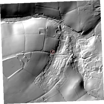 Shaded relief map of the ground around TR25QT, computed from Environment Agency LiDAR. The ground here sits at about 56 m above sea level and falls 64 m across the surrounding 800 m. Surface water reaching this point runs off ground lying to the west, 19.4 m higher.