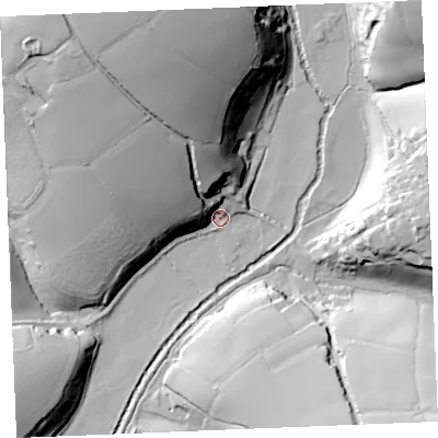 Shaded relief map of the ground around TR25TY, computed from Environment Agency LiDAR. The ground here sits at about 10 m above sea level and falls 59 m across the surrounding 800 m. Surface water reaching this point runs off ground lying to the north-north-west, 55.1 m higher.