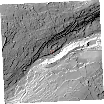 Shaded relief map of the ground around TR261BD, computed from Environment Agency LiDAR. The ground here sits at about 62 m above sea level and falls 85 m across the surrounding 800 m. Surface water reaching this point runs off ground lying to the south, 51.6 m higher.