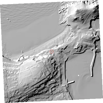 Shaded relief map of the ground around TR261HT, computed from Environment Agency LiDAR. The ground here sits at about 10 m above sea level and falls 59 m across the surrounding 800 m. Surface water reaching this point runs off ground lying to the south-south-west, 23.3 m higher.