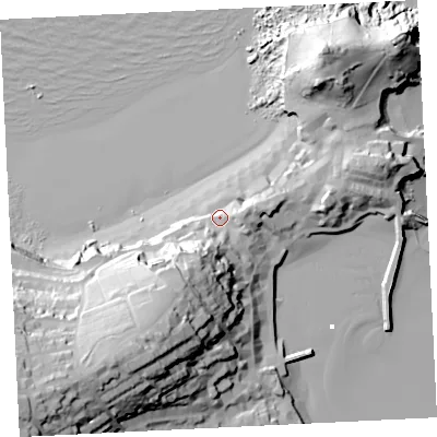 Shaded relief map of the ground around TR261NF, computed from Environment Agency LiDAR. The ground here sits at about 10 m above sea level and falls 58 m across the surrounding 800 m. Surface water reaching this point runs off ground lying to the south-south-west, 23.4 m higher.