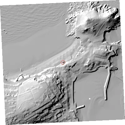 Shaded relief map of the ground around TR261NG, computed from Environment Agency LiDAR. The ground here sits at about 7 m above sea level and falls 57 m across the surrounding 800 m. Surface water reaching this point runs off ground lying to the south-east, 8.9 m higher.
