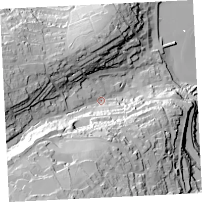 Shaded relief map of the ground around TR261QF, computed from Environment Agency LiDAR. The ground here sits at about 23 m above sea level and falls 97 m across the surrounding 800 m. Surface water reaching this point runs off ground lying to the south-west, 74.3 m higher.