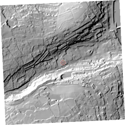 Shaded relief map of the ground around TR261QU, computed from Environment Agency LiDAR. The ground here sits at about 32 m above sea level and falls 96 m across the surrounding 800 m. Surface water reaching this point runs off ground lying to the west, 5.2 m higher.