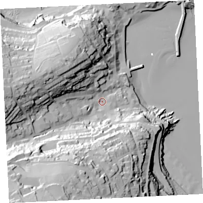 Shaded relief map of the ground around TR261SB, computed from Environment Agency LiDAR. The ground here sits at about 12 m above sea level and falls 91 m across the surrounding 800 m. Surface water reaching this point runs off ground lying to the south-west, 77.1 m higher.