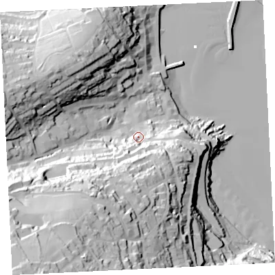 Shaded relief map of the ground around TR261SF, computed from Environment Agency LiDAR. The ground here sits at about 20 m above sea level and falls 97 m across the surrounding 800 m. Surface water reaching this point runs off ground lying to the south-south-west, 30.4 m higher.