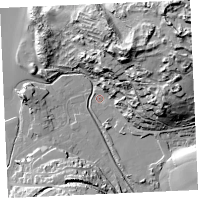 Shaded relief map of the ground around TR60BX, computed from Environment Agency LiDAR. The ground here sits at about 5 m above sea level and falls 76 m across the surrounding 800 m. Surface water reaching this point runs off ground lying to the east-north-east, 60.3 m higher.