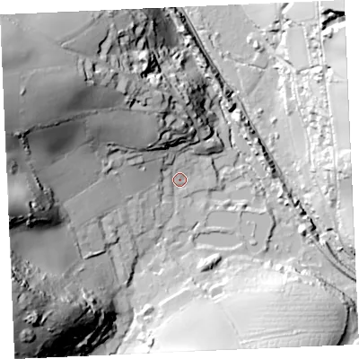 Shaded relief map of the ground around TR60DH, computed from Environment Agency LiDAR. The ground here sits at about 11 m above sea level and falls 73 m across the surrounding 800 m. Surface water reaching this point runs off ground lying to the north-west, 51.6 m higher.