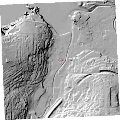 Shaded relief map of the ground around TR60ER, computed from Environment Agency LiDAR. The ground here sits at about 6 m above sea level and falls 63 m across the surrounding 800 m. Surface water reaching this point runs off ground lying to the west, 56.1 m higher.