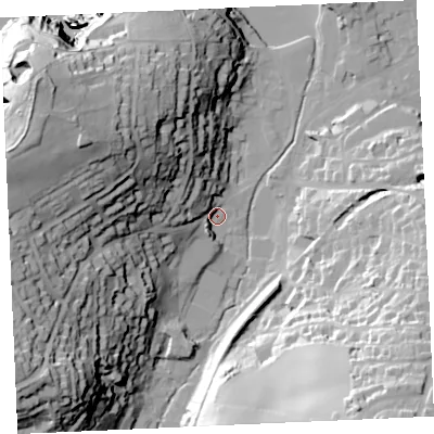 Shaded relief map of the ground around TR60PB, computed from Environment Agency LiDAR. The ground here sits at about 7 m above sea level and falls 69 m across the surrounding 800 m. Surface water reaching this point runs off ground lying to the west-north-west, 17.6 m higher.