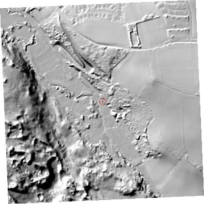 Shaded relief map of the ground around TR85PS, computed from Environment Agency LiDAR. The ground here sits at about 11 m above sea level and falls 66 m across the surrounding 800 m. Surface water reaching this point runs off ground lying to the east, 62.8 m higher.