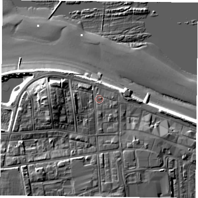 Shaded relief map of the ground around TS101AH, computed from Environment Agency LiDAR. The ground here sits at about 7 m above sea level and falls 13 m across the surrounding 800 m. Surface water reaching this point runs off ground lying to the west-south-west, 2.5 m higher.