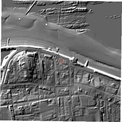 Shaded relief map of the ground around TS101AT, computed from Environment Agency LiDAR. The ground here sits at about 6 m above sea level and falls 13 m across the surrounding 800 m. Surface water reaching this point runs off ground lying to the south, 1.8 m higher.