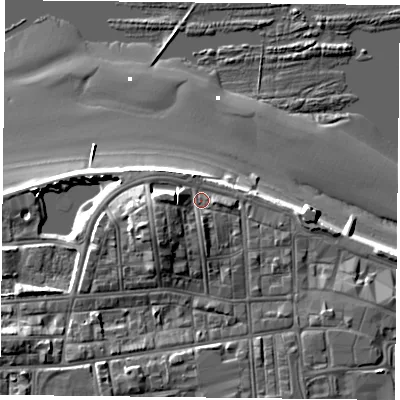 Shaded relief map of the ground around TS101AU, computed from Environment Agency LiDAR. The ground here sits at about 7 m above sea level and falls 13 m across the surrounding 800 m. Surface water reaching this point runs off ground lying to the south-west, 4.7 m higher.