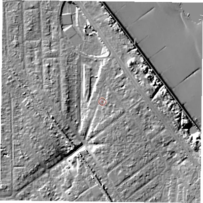 Shaded relief map of the ground around TS103AZ, computed from Environment Agency LiDAR. The ground here sits at about 7 m above sea level and falls 12 m across the surrounding 800 m. Surface water reaching this point runs off ground lying to the south-east, 1.1 m higher.