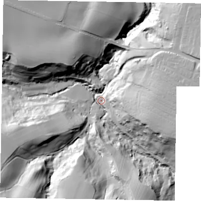 Shaded relief map of the ground around TS135DT, computed from Environment Agency LiDAR. The ground here sits at about 13 m above sea level and falls 48 m across the surrounding 800 m. Surface water reaching this point runs off ground lying to the south-west, 46.0 m higher.