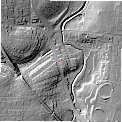 Shaded relief map of the ground around TS184ES, computed from Environment Agency LiDAR. The ground here sits at about 12 m above sea level and falls 16 m across the surrounding 800 m. Surface water reaching this point runs off ground lying to the south-south-east, 1.6 m higher.