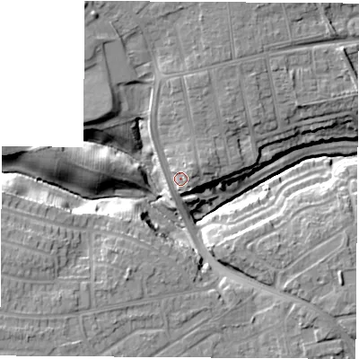 Shaded relief map of the ground around TS185AN, computed from Environment Agency LiDAR. The ground here sits at about 19 m above sea level and falls 15 m across the surrounding 800 m. Surface water reaching this point runs off ground lying to the north, 5.1 m higher.