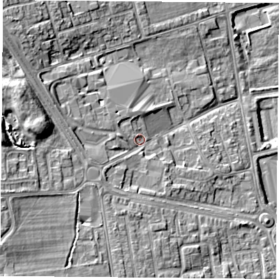 Shaded relief map of the ground around TS249AJ, computed from Environment Agency LiDAR. The ground here sits at about 11 m above sea level and falls 14 m across the surrounding 800 m. Surface water reaching this point runs off ground lying to the west, 8.2 m higher.