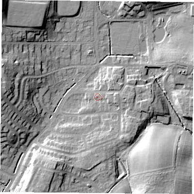 Shaded relief map of the ground around TS260AB, computed from Environment Agency LiDAR. The ground here sits at about 25 m above sea level and falls 24 m across the surrounding 800 m. Surface water reaching this point runs off ground lying to the north-east, 3.6 m higher.