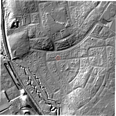 Shaded relief map of the ground around TS37PU, computed from Environment Agency LiDAR. The ground here sits at about 11 m above sea level and falls 13 m across the surrounding 800 m. Surface water reaching this point runs off ground lying to the south-east, 9.0 m higher.