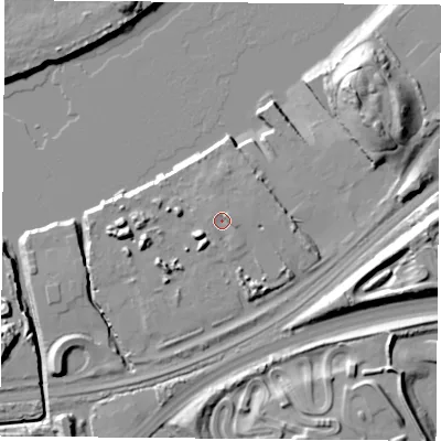Shaded relief map of the ground around TS38AT, computed from Environment Agency LiDAR. The ground here sits at about 7 m above sea level and falls 22 m across the surrounding 800 m. Surface water reaching this point runs off ground lying to the north-east, 1.8 m higher.