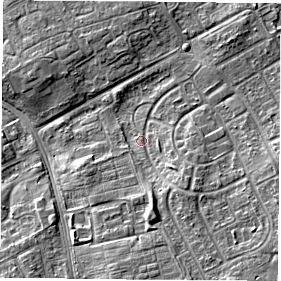Shaded relief map of the ground around TS39JD, computed from Environment Agency LiDAR. The ground here sits at about 11 m above sea level and falls 9 m across the surrounding 800 m. Surface water reaching this point runs off ground lying to the south, 6.1 m higher.