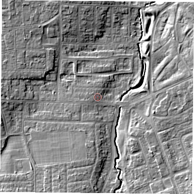Shaded relief map of the ground around TS57QJ, computed from Environment Agency LiDAR. The ground here sits at about 11 m above sea level and falls 9 m across the surrounding 800 m. Surface water reaching this point runs off ground lying to the west-south-west, 0.8 m higher.