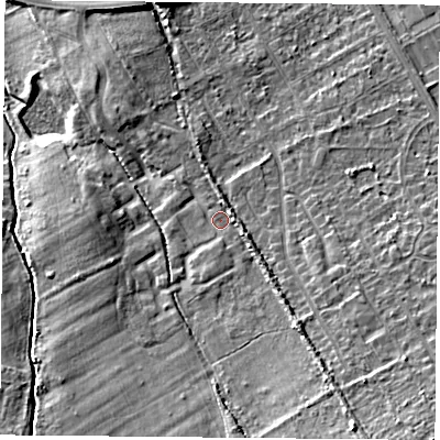 Shaded relief map of the ground around TS60GA, computed from Environment Agency LiDAR. The ground here sits at about 15 m above sea level and falls 12 m across the surrounding 800 m. Surface water reaching this point runs off ground lying to the south-east, 2.2 m higher.