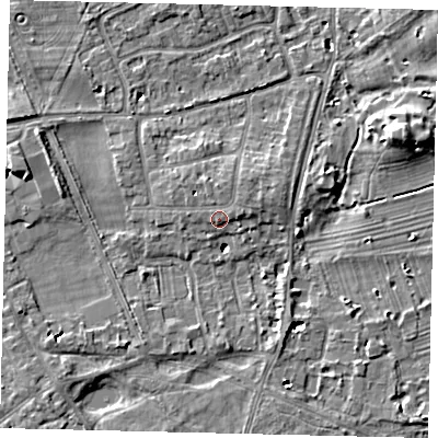 Shaded relief map of the ground around TW107BS, computed from Environment Agency LiDAR. The ground here sits at about 9 m above sea level and falls 8 m across the surrounding 800 m. Surface water reaching this point runs off ground lying to the north, 0.6 m higher.