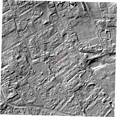 Shaded relief map of the ground around TW107LG, computed from Environment Agency LiDAR. The ground here sits at about 7 m above sea level and falls 6 m across the surrounding 800 m. Surface water reaching this point runs off ground lying to the east-south-east, 1.6 m higher.