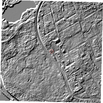 Shaded relief map of the ground around TW107NB, computed from Environment Agency LiDAR. The ground here sits at about 8 m above sea level and falls 6 m across the surrounding 800 m. Surface water reaching this point runs off ground lying to the south-south-east, 2.3 m higher.