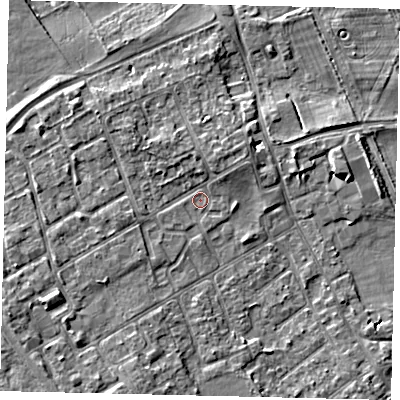 Shaded relief map of the ground around TW107PG, computed from Environment Agency LiDAR. The ground here sits at about 7 m above sea level and falls 5 m across the surrounding 800 m. Surface water reaching this point runs off ground lying to the north-north-east, 2.1 m higher.