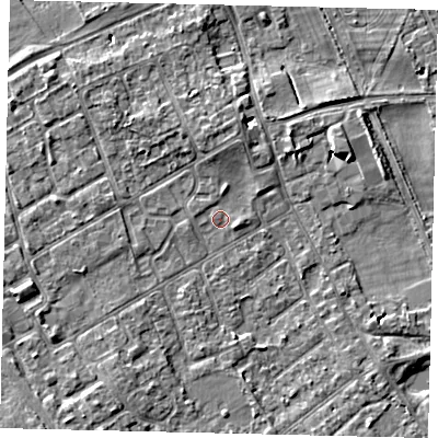 Shaded relief map of the ground around TW107PL, computed from Environment Agency LiDAR. The ground here sits at about 7 m above sea level and falls 5 m across the surrounding 800 m. Surface water reaching this point runs off ground lying to the north, 2.1 m higher.