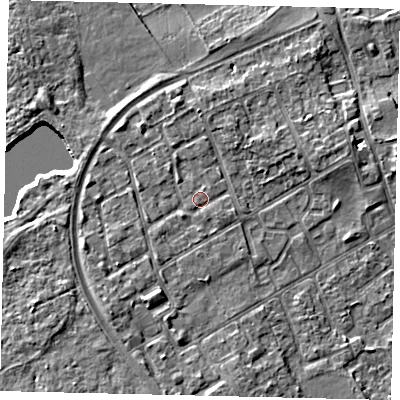 Shaded relief map of the ground around TW107QX, computed from Environment Agency LiDAR. The ground here sits at about 8 m above sea level and falls 5 m across the surrounding 800 m. Surface water reaching this point runs off ground lying to the north-north-east, 1.7 m higher.
