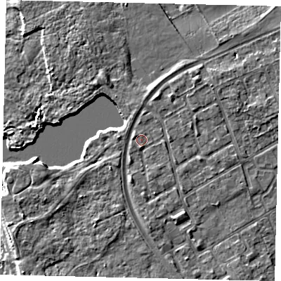Shaded relief map of the ground around TW107SG, computed from Environment Agency LiDAR. The ground here sits at about 8 m above sea level and falls 6 m across the surrounding 800 m. Surface water reaching this point runs off ground lying to the south, 1.8 m higher.