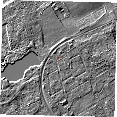 Shaded relief map of the ground around TW107SJ, computed from Environment Agency LiDAR. The ground here sits at about 7 m above sea level and falls 6 m across the surrounding 800 m. Surface water reaching this point runs off ground lying to the east-north-east, 1.9 m higher.