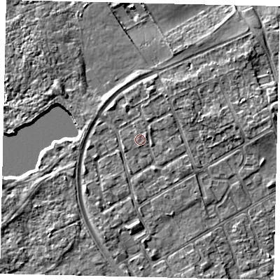 Shaded relief map of the ground around TW107SP, computed from Environment Agency LiDAR. The ground here sits at about 8 m above sea level and falls 5 m across the surrounding 800 m. Surface water reaching this point runs off ground lying to the north-north-east, 1.4 m higher.