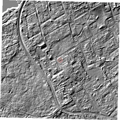 Shaded relief map of the ground around TW107UR, computed from Environment Agency LiDAR. The ground here sits at about 8 m above sea level and falls 6 m across the surrounding 800 m. Surface water reaching this point runs off ground lying to the south, 1.9 m higher.