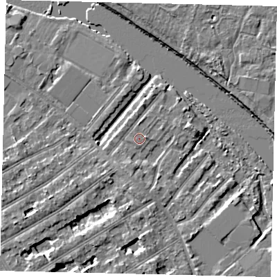 Shaded relief map of the ground around TW119QW, computed from Environment Agency LiDAR. The ground here sits at about 6 m above sea level and falls 6 m across the surrounding 800 m. Surface water reaching this point runs off ground lying to the north, 0.6 m higher.