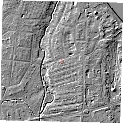 Shaded relief map of the ground around TW11PA, computed from Environment Agency LiDAR. The ground here sits at about 7 m above sea level and falls 10 m across the surrounding 800 m. Surface water reaching this point runs off ground lying to the east, 1.2 m higher.