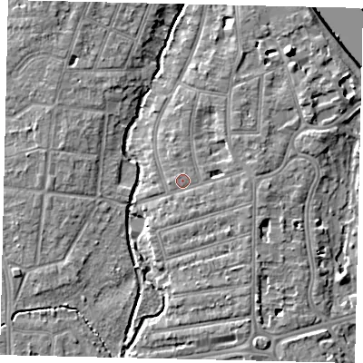 Shaded relief map of the ground around TW11PB, computed from Environment Agency LiDAR. The ground here sits at about 7 m above sea level and falls 10 m across the surrounding 800 m. Surface water reaching this point runs off ground lying to the east, 1.1 m higher.