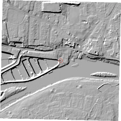 Shaded relief map of the ground around TW122ET, computed from Environment Agency LiDAR. The ground here sits at about 9 m above sea level and falls 17 m across the surrounding 800 m. Surface water reaching this point runs off ground lying to the north-west, 11.4 m higher.