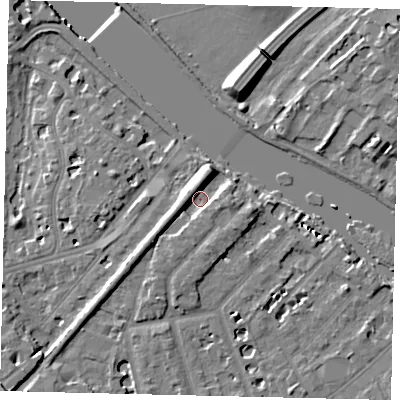 Shaded relief map of the ground around TW12DB, computed from Environment Agency LiDAR. The ground here sits at about 5 m above sea level and falls 9 m across the surrounding 800 m. Surface water reaching this point runs off ground lying to the north, 6.2 m higher.