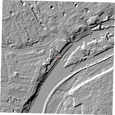 Shaded relief map of the ground around TW14QH, computed from Environment Agency LiDAR. The ground here sits at about 6 m above sea level and falls 9 m across the surrounding 800 m. Surface water reaching this point runs off ground lying to the north-west, 6.2 m higher.