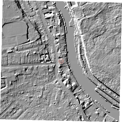 Shaded relief map of the ground around TW14SL, computed from Environment Agency LiDAR. The ground here sits at about 5 m above sea level and falls 8 m across the surrounding 800 m. Surface water reaching this point runs off ground lying to the north, 1.4 m higher.